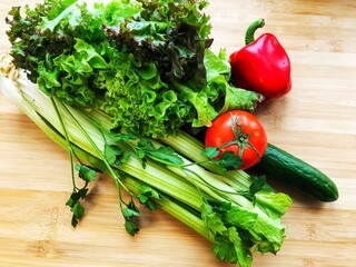 fresh organic vegetables on a wooden table. proper nutrition.