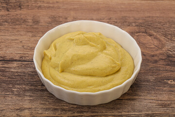Dijon mustard sauce in the bowl
