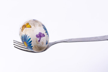 quail eggs on a spoon
