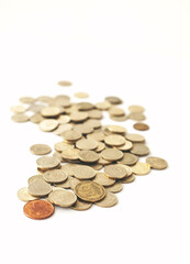 Mixed coin stacks on a white background