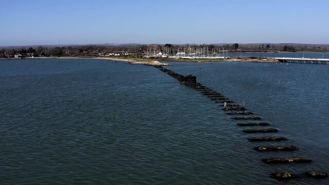 The Old Hayling Island Railway Bridge across Langstone Harbour aerial footage of the remains of this wooden bridge that was closed in 1963 and was a branch line from Havant to Hayling Island.