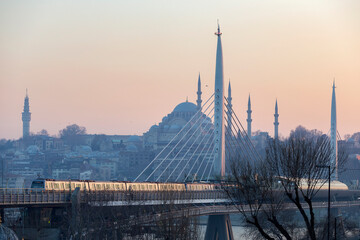Turkey. Istanbul. Halich metro bridge. Metro train on the bridge.