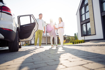 Full size profile photo of optimistic full family say good bye wear casual cloth near home car outdoors