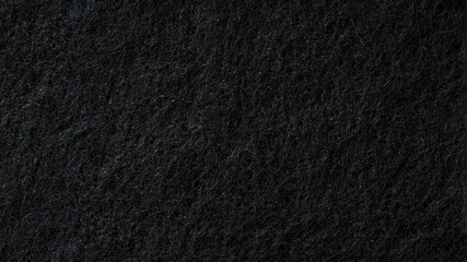 Fototapeta premium black sponge texture as background. abstract black background.