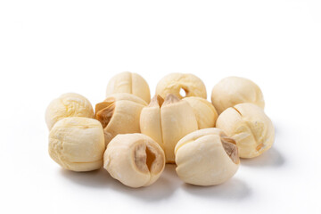 Close up of dried lotus seed isolated on white background