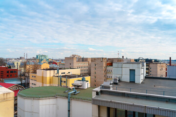 Roofs of St. Petersburg in an industrial and residential area. St Petersburg, Russia - 28 Mar 2021