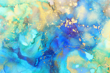 art photography of abstract fluid art painting with alcohol ink, blue, green, yellow and gold colors