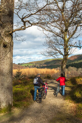 Naklejka premium Family cycling in the Wicklow mountains of Ireland