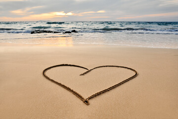 Heart drawn on the tropical beach