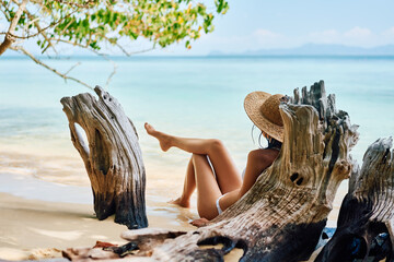 Pretty young woman enjoy sea on tropical paradise beach