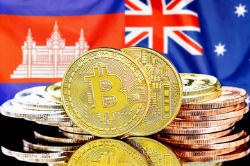 Concept for investors in cryptocurrency and Blockchain technology in the Algeria and Australia. Bitcoins on the background of the flag Algeria and Australia