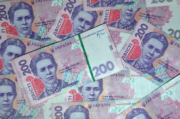 Ukrainian money (UAH). A stack of 200 hryvnia  on 200 hryvnia backround. Business and finance concept