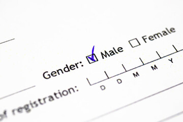 Gender checkbox close-up, male and female official document backrgound