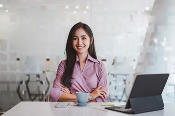 Portrait of confident smiling asian business woman in casual wear at meeting room.