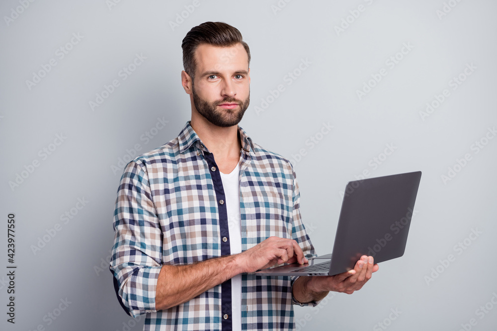 Sticker photo portrait of serious confident freelancer programmer working on start-up project isolated on gr