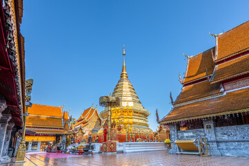 Wat Phra That Doi Suthep with clear blue sky and evening sunlight, the most famous temple in Chiang Mai, Thailand