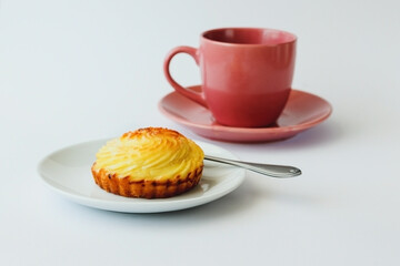 Dessert cottage cheese cake basket on a white plate.