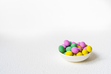 Close up of a pile of colorful chocolate coated candy