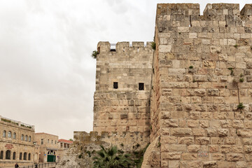 Outer fortress walls of the City of David on a rainy day near the Yafo Gate in the old city of...