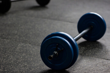 Obraz na płótnie Canvas dumbbell weights on the floor of a gym