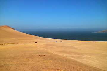 The Vast Sand Dunes of Paracas National Reserve with Pacific Ocean in the Backdrop, Ica Region, Peru, South America
