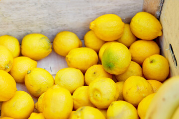 Colorful Display Of Lemons In Market