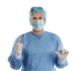 Doctor holding medical clamps and scalpel on light background. Surgical instruments