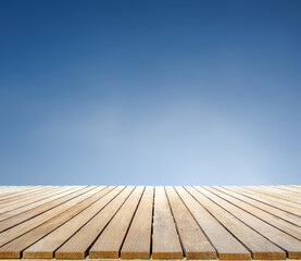 Wooden table top with empty blue sky Display Advertisement background