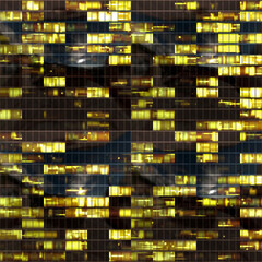 Skyscraper windows. Abstract windows texture. Skyscraper. Modern building background. Night. The light from windows. Seamless backdrop.