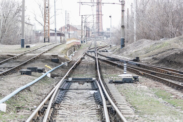Naklejka na ściany i meble Railway tracks, close-up old train rails, railway infrastructure,