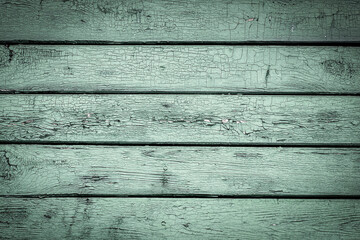 Natural Wooden Background. Old painted in green boards