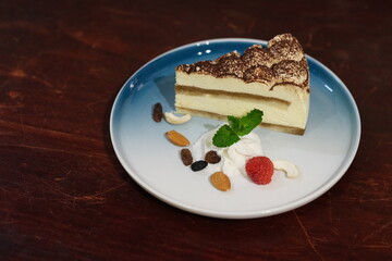 plate of chocolate Tiramisu cake on table