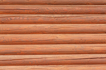 Naklejka premium Texture of a wooden blockhouse made of logs.