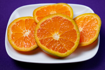 Naklejka na ściany i meble orange on a plate