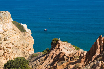 Fototapeta na wymiar Landscape of the coast in Portimao, one of the most famous seascape of Portugal, located on the Atlantic coast in Lagoa, Algarve.
