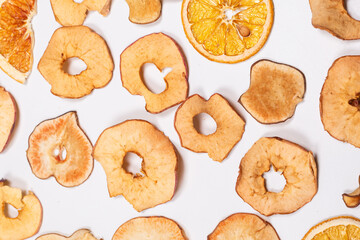 Dried fruit isolated on white background. Dried grapefruit, dried apple, dried pear.