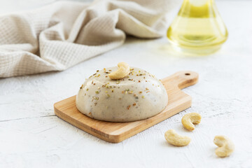 Homemade vegan cashew cheese with olive oil.