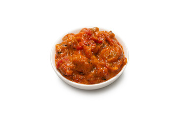 Vegetable stew in a bowl isolated on white background.