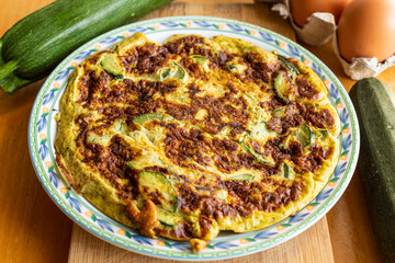 Omelette with zucchini. Homemade omelette, typical mediterranean dish