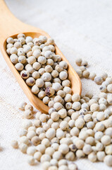 Dried white peppercorn seeds.