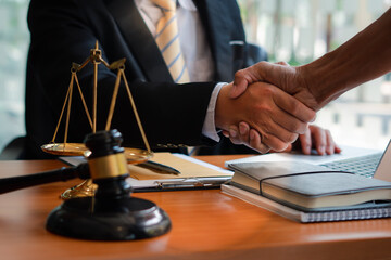 Businessman shaking hands to seal a deal with his partner