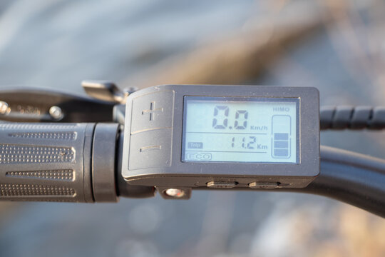 Ukraine Dnipro 30.03.2021 - Xiaomi HIMO C26 electric bike with camera pro 9 on the handlebars in the forest in spring, eco