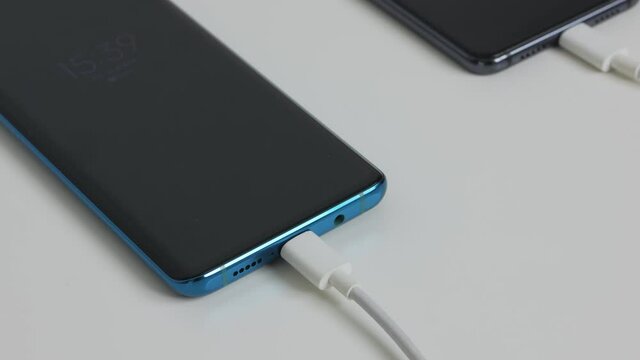 Close-up of the charging connection to your phone. Phone charging port. Charging your phone by wire.