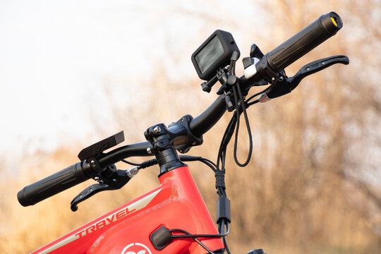 Ukraine Dnipro 30.03.2021 - Xiaomi HIMO C26 electric bike with camera pro 9 on the handlebars in the forest in spring, eco