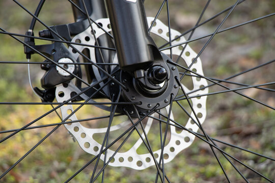 Ukraine Dnipro 30.03.2021 - Xiaomi HIMO C26 electric bike with camera pro 9 on the handlebars in the forest in spring, eco