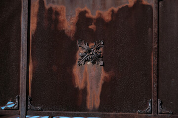 old structure with rusty iron decorations.