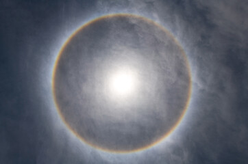Sun halo optical phenomenon in sky.