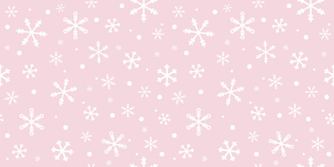 Pink and white snowflakes vector pattern background