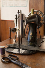 Sewing machine at home. Sew workshop. textile vintage sewing on wood table, sustainable sewing