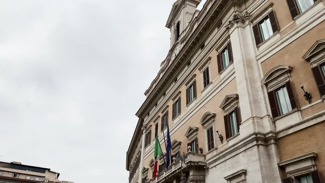 the facade of the Montecitorio palace in Rome.